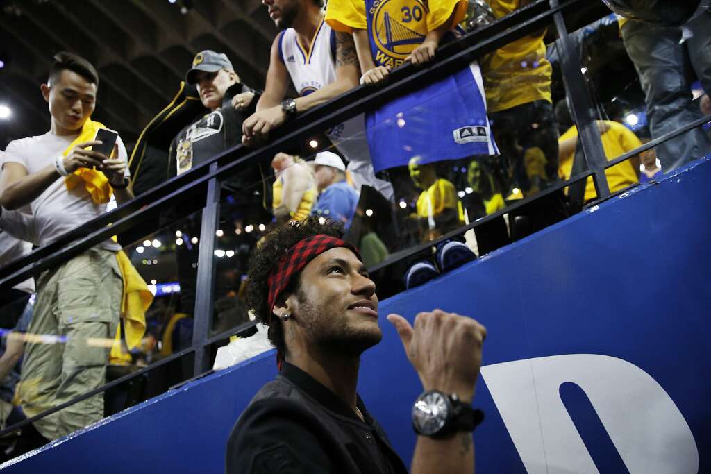 Brazilian soccer star Neymar exits after spectating Game 2 of the NBA Finals between the Golden State Warriors and the Cleveland Cavaliers on Sunday, June 4, 2017, at Oracle Arena in Oakland, Calif. Photo: Santiago Mejia, The Chronicle