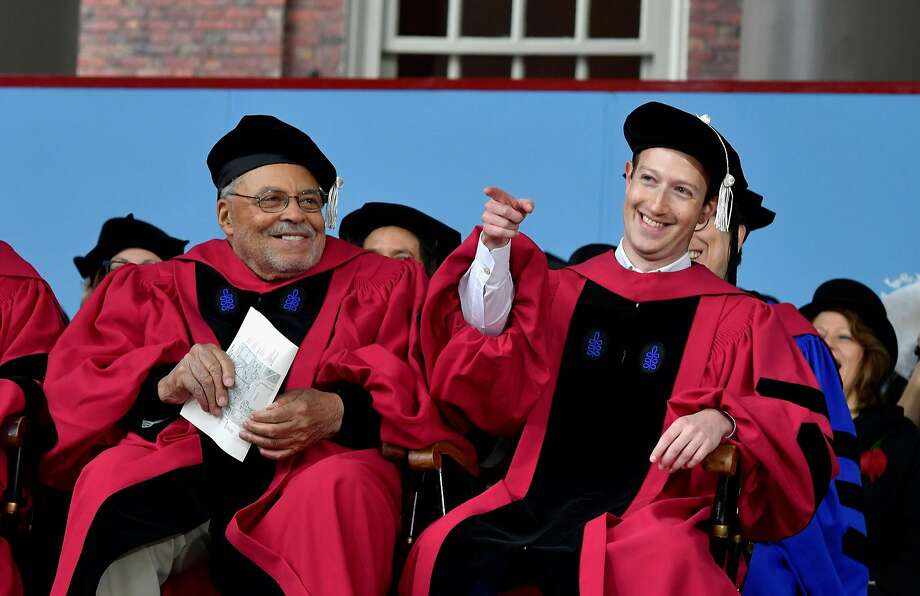 Facebook CEO Mark Zuckerberg (right), shown in May receiving an honorary degree from Harvard, also supports the universal income concept. Photo: Paul Marotta, Getty Images
