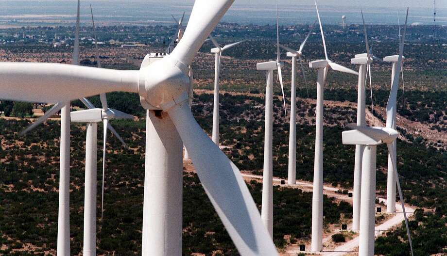 Sleek white wind turbines, 25 stories tall, rise from the plains of West Texas in Big Spring. Texas is one of the windiest states in the nation and the Panhandle and West Texas are the state's windiest regions. Photo: CAROLYN MARY BAUMAN, STF / KRT