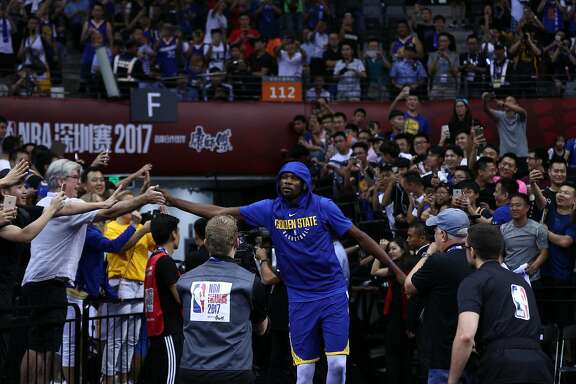 SHENZHEN, CHINA - OCTOBER 05:  Kevin Durant #35 of the Golden State Warriors enters the court before the game between the Minnesota Timberwolves and the Golden State Warriors as part of 2017 NBA Global Games China at Universidade Center on October 5, 2017 in Shenzhen, China.  (Photo by Zhong Zhi/Getty Images)