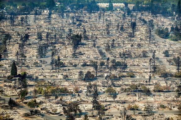 Homes leveled by the Tubbs fire line the Coffey Park neighborhood of Santa Rosa, Calif., on Wednesday, Oct. 11, 2017.