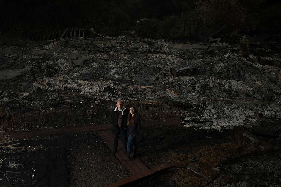 Lisa Tieber Nielson and Dan Nielson, who escaped with their two children as the Tubbs Fire roared through Santa Rosa, say a better warning system would have helped residents. Photo: Noah Berger, Special To The Chronicle