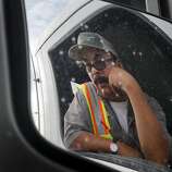 Gabriel Suarez says some drivers are looking for other kinds of work because of the long delays at the port Wednesday December 17, 2014. Truck drivers at the Port of Oakland often face long waits to get inside the terminals and pick up cargo in a timely manner.