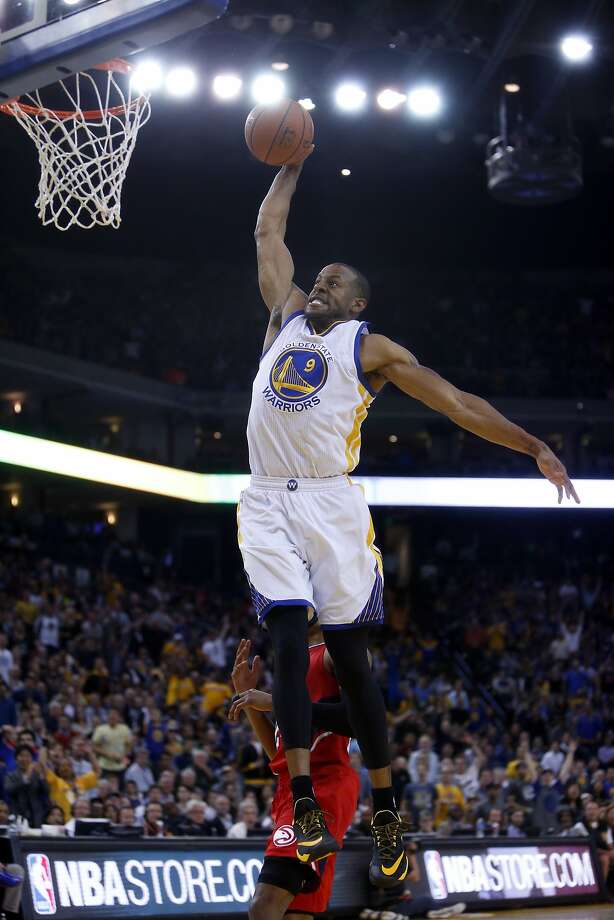 Andre Iguodala flies high for a fourth quarter dunk that put the Warriors ahead 90-66. Photo: Scott Strazzante, The Chronicle