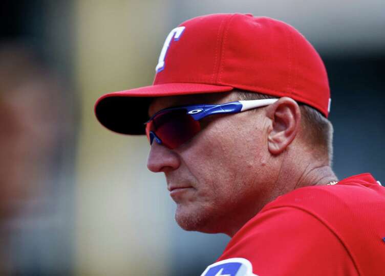 Texas Rangers manager Jeff Banister looks on from the 