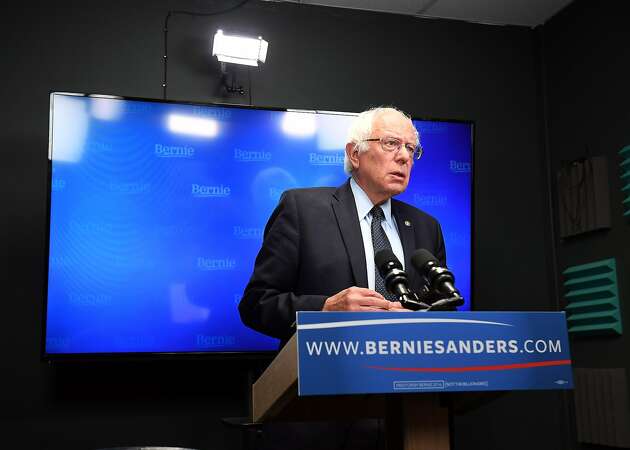 Sanders doesn't quit, doesn't endorse Clinton but changes focus