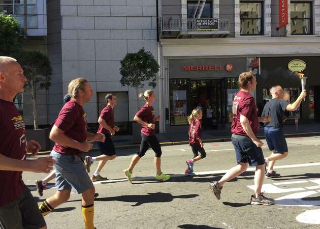 SF police run Special Olympics torch through city