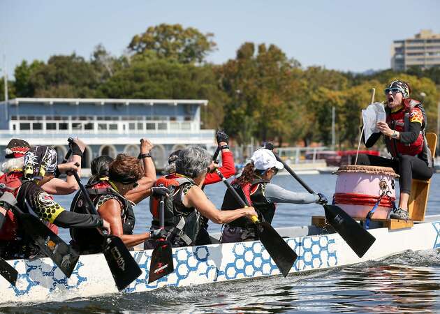 Dragon boats race on Lake Merritt