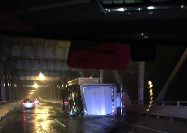 High winds whip Richmond San Rafael Bridge, blow over UPS truck