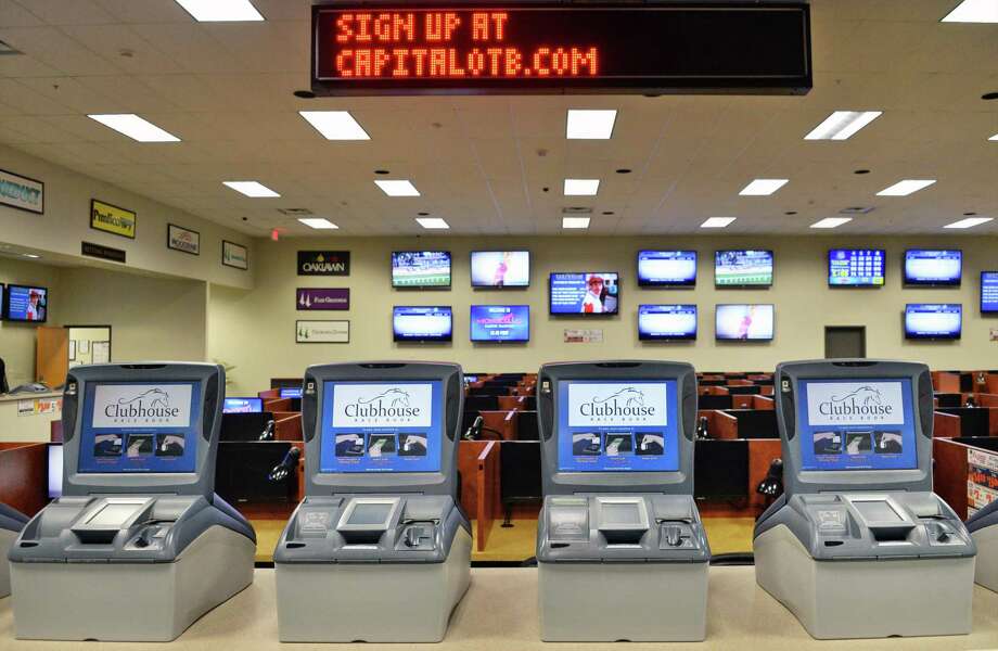 Self-serve terminals inside the Albany OTB clubhouse on Central Avenue Wednesday, Feb. 4, 2015, in Albany, N.Y.  (John Carl D'Annibale / Times Union) Photo: John Carl D'Annibale / 00030436A