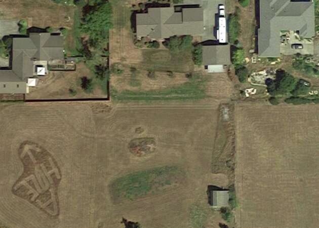 Google Earth reveals neighbor's insult carved into the grass
