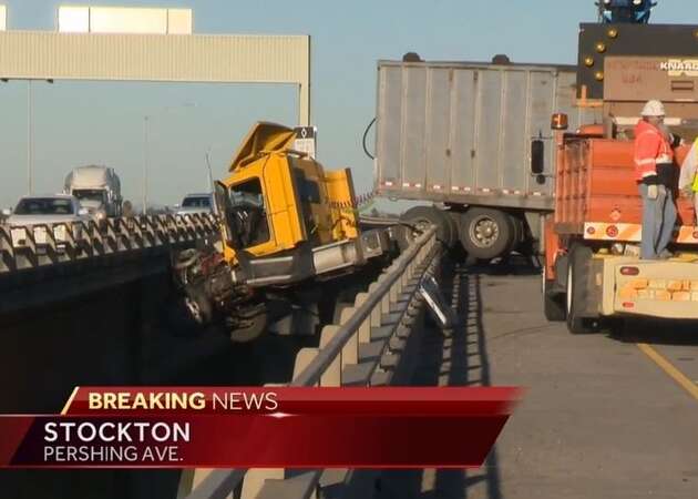 I-5 lanes closed in Stockton as Big Rig dangles from overpass